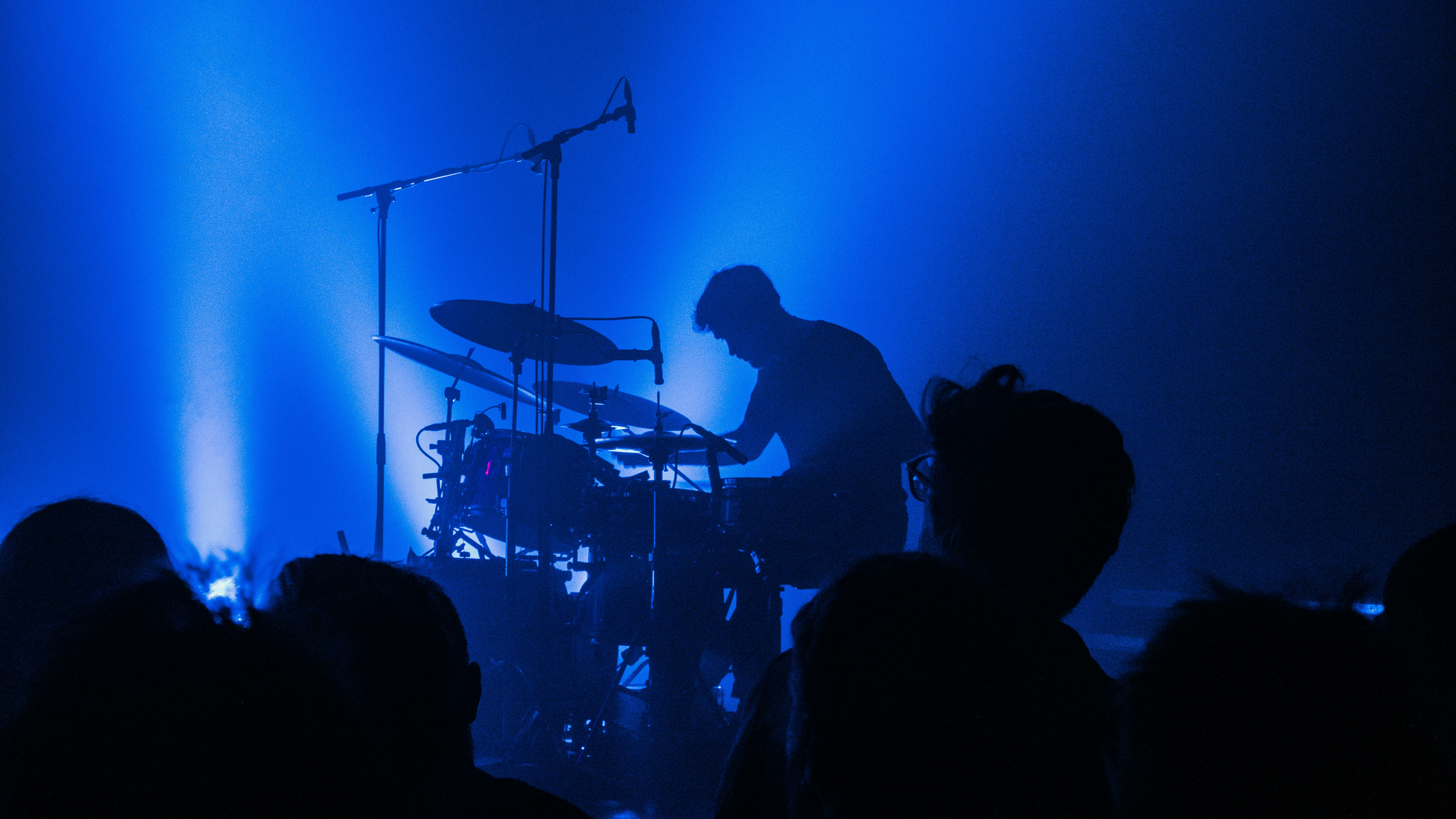 Live band performance on a well-lit stage