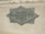 A textured metal plaque mounted on a stone surface, with the words 'Member Federal Reserve System' engraved in a diamond shape.