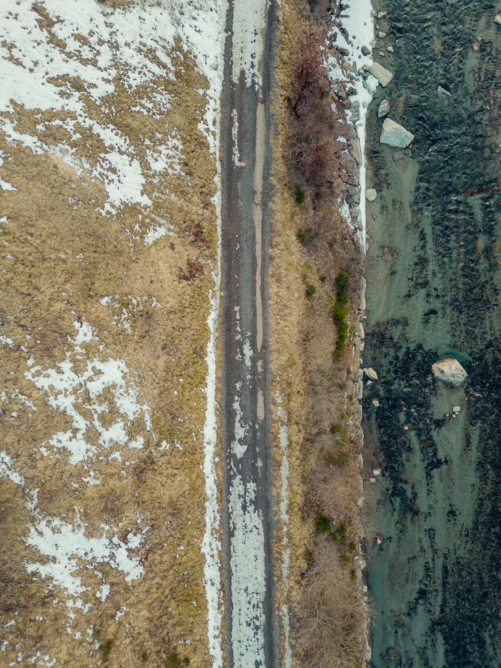 an aerial view of a road in the middle of nowhere