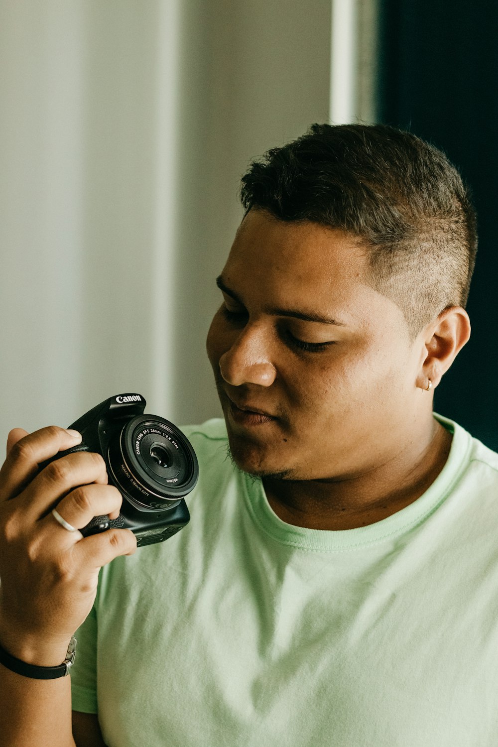 a man taking a picture of himself with a camera