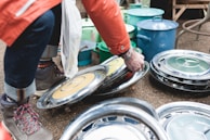 A person examining copper scrap for quality assessment.