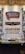 A bar with a white tile backsplash features multiple beer taps lined up in a neat row. Above the taps are signage for Lansing Brewing Company and Hard Nose Spirits. Shelves on either side hold bottles, and a wooden ceiling adds a rustic touch.