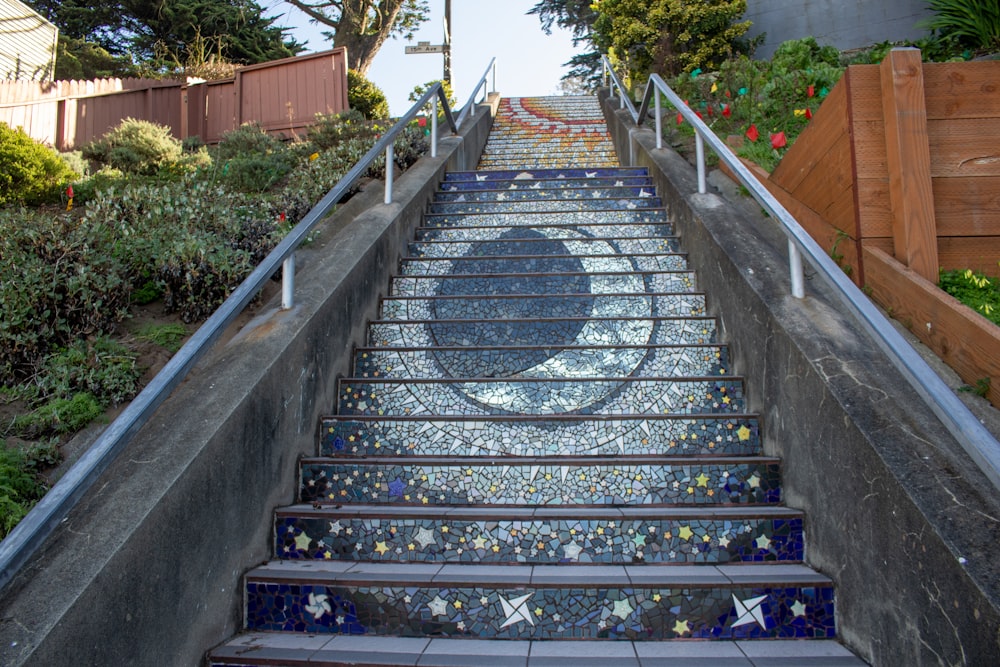 a set of stairs with a circular design painted on it