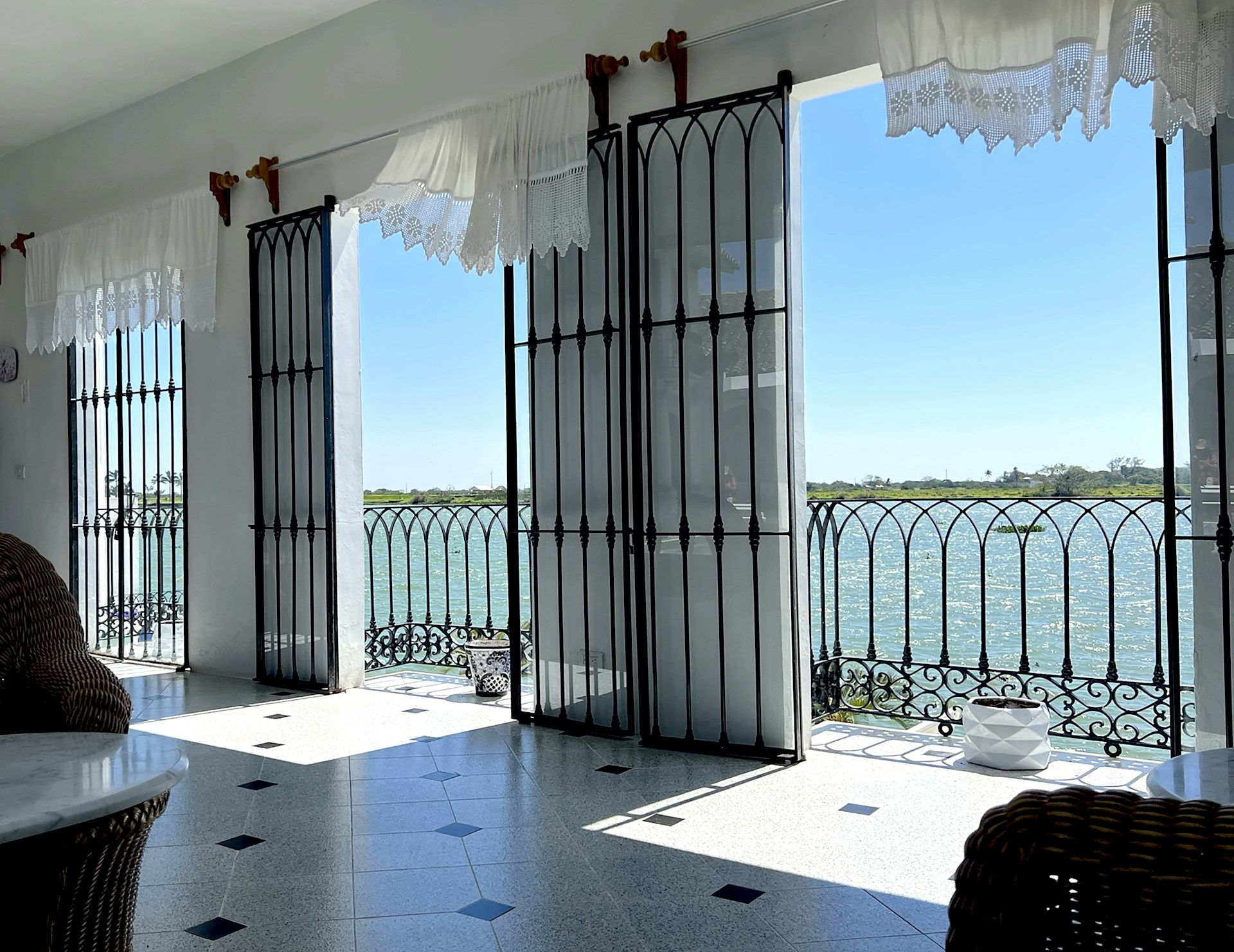 woman wearing yellow long-sleeved dress under white clouds and blue sky during daytime