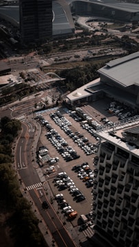 A wide shot of a completed parking lot with fresh asphalt near Putrajaya.