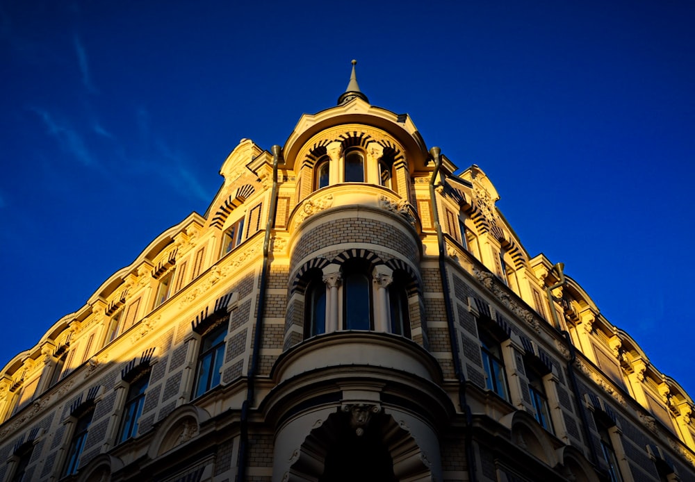 a tall building with a clock on the top of it