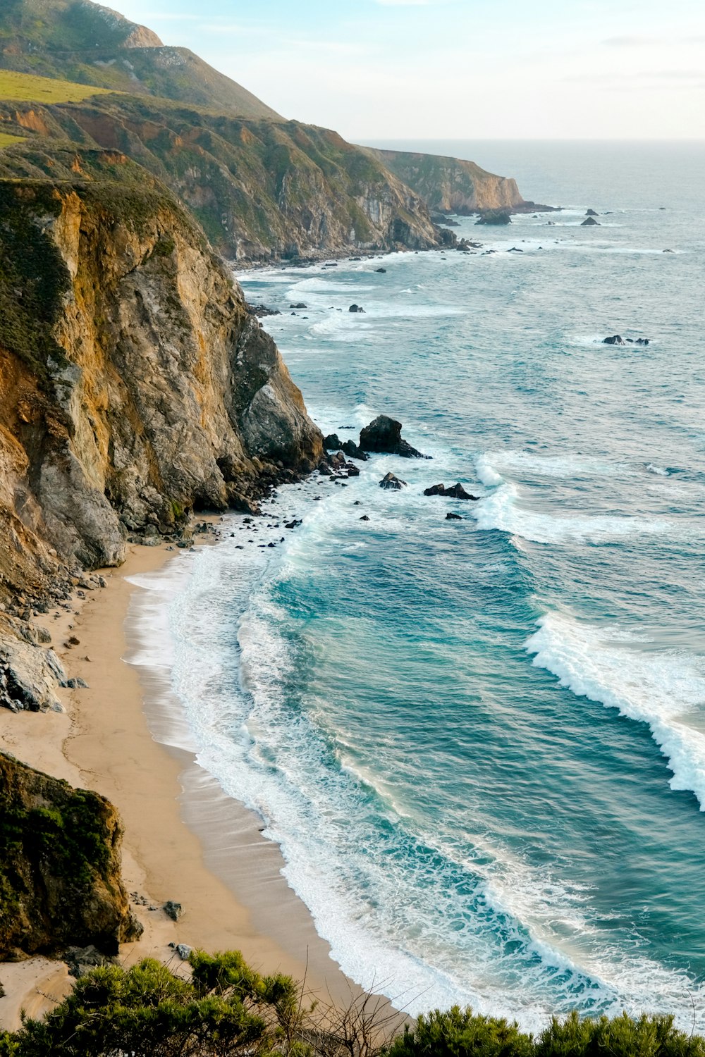 a view of the ocean from a cliff