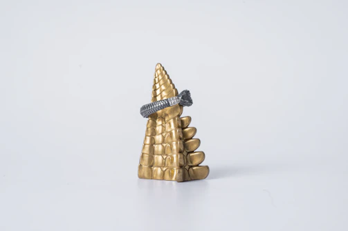 Premium abacus with golden and rose gold accents on a clean white background.