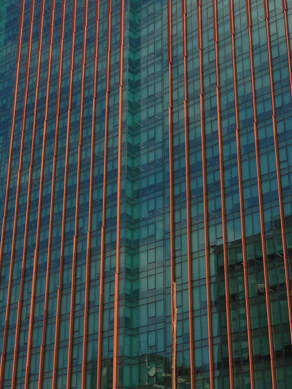 a tall building with a clock on the side of it