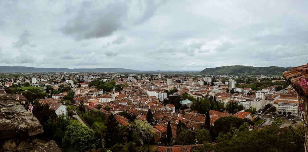 a view of a city from the top of a hill