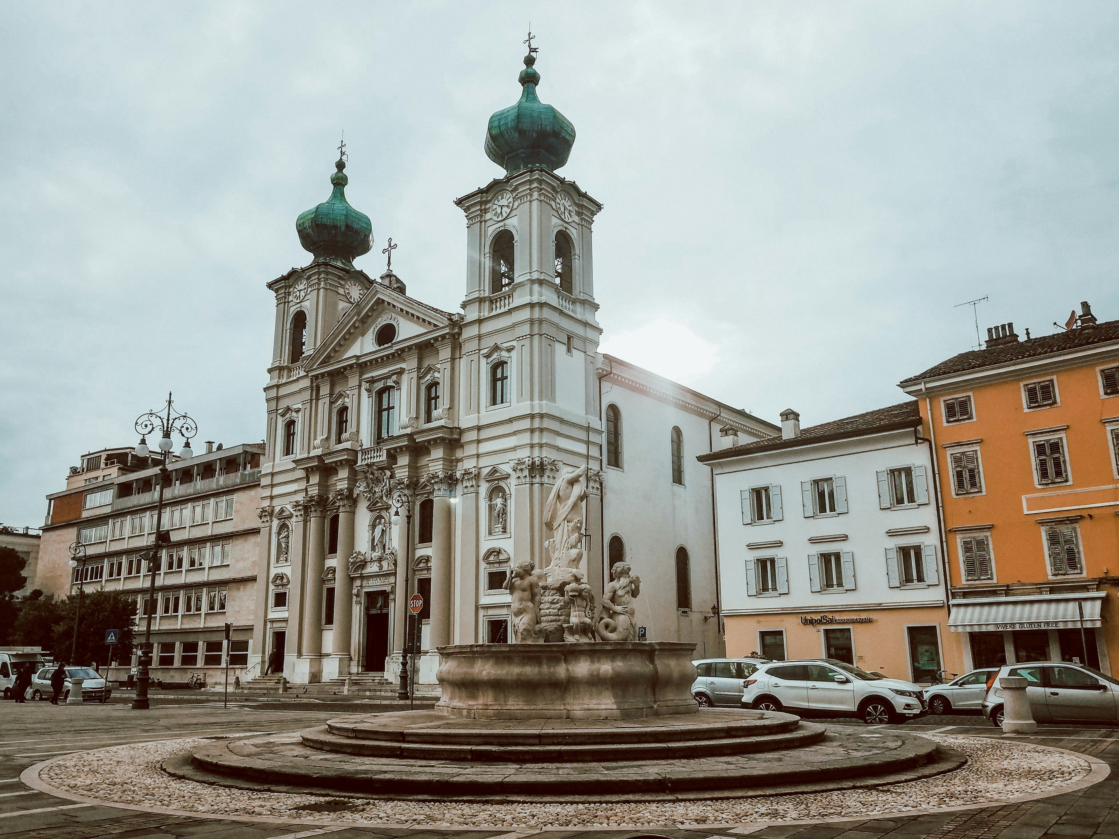 a building with a fountain in front of it