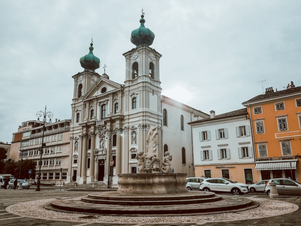 a building with a fountain in front of it