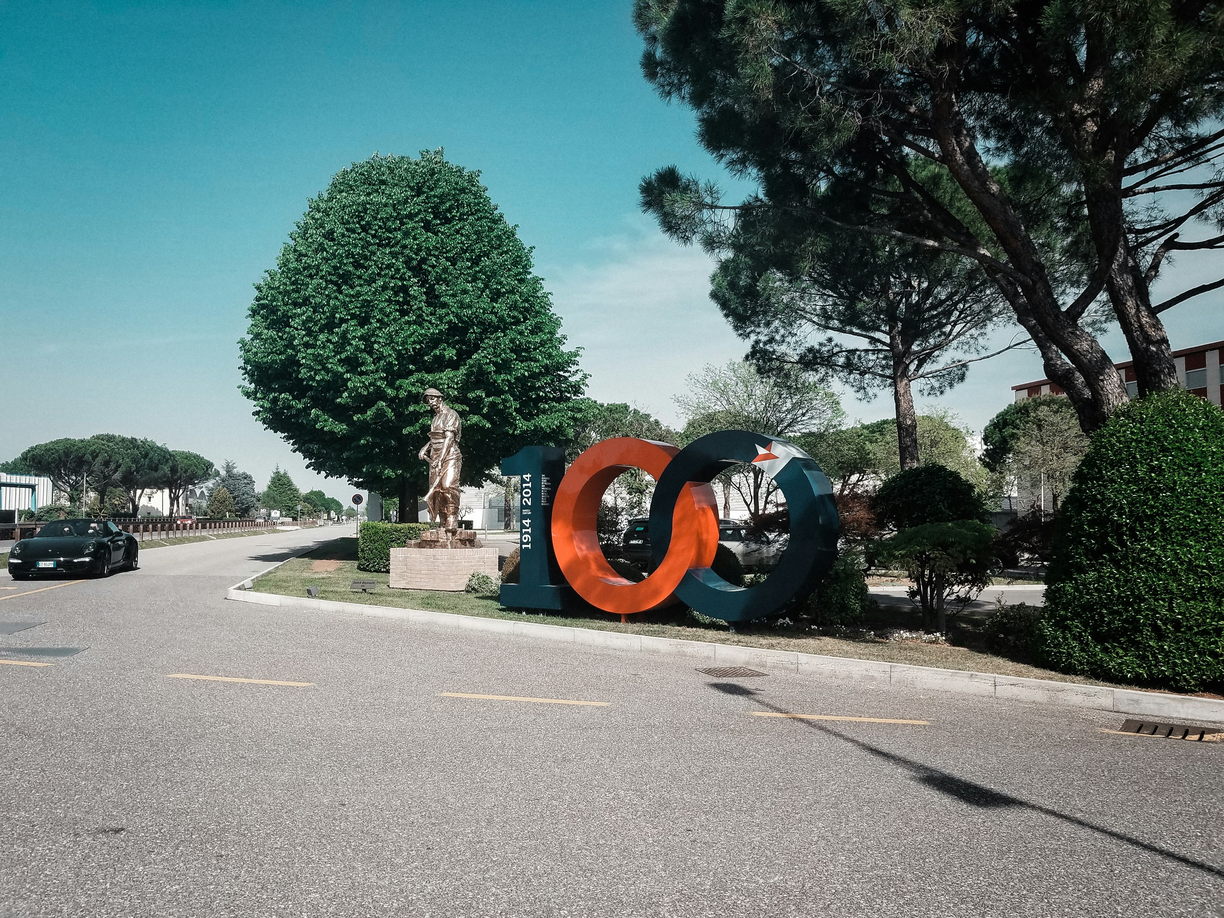 a street with cars parked on the side of it
