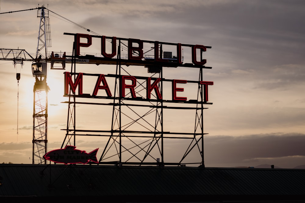 a sign that reads public market on top of a building