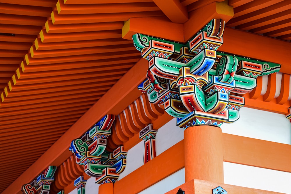 a close up of a decorative object on a building