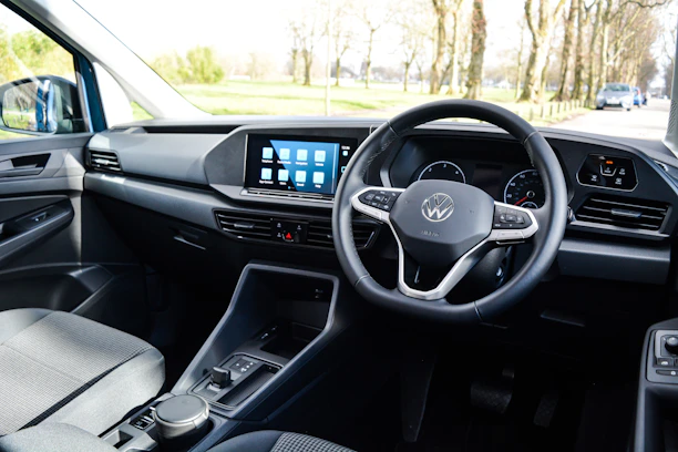 Neumorphic style UX/UI design showing four car-related icons connected by arrows representing a smooth process.