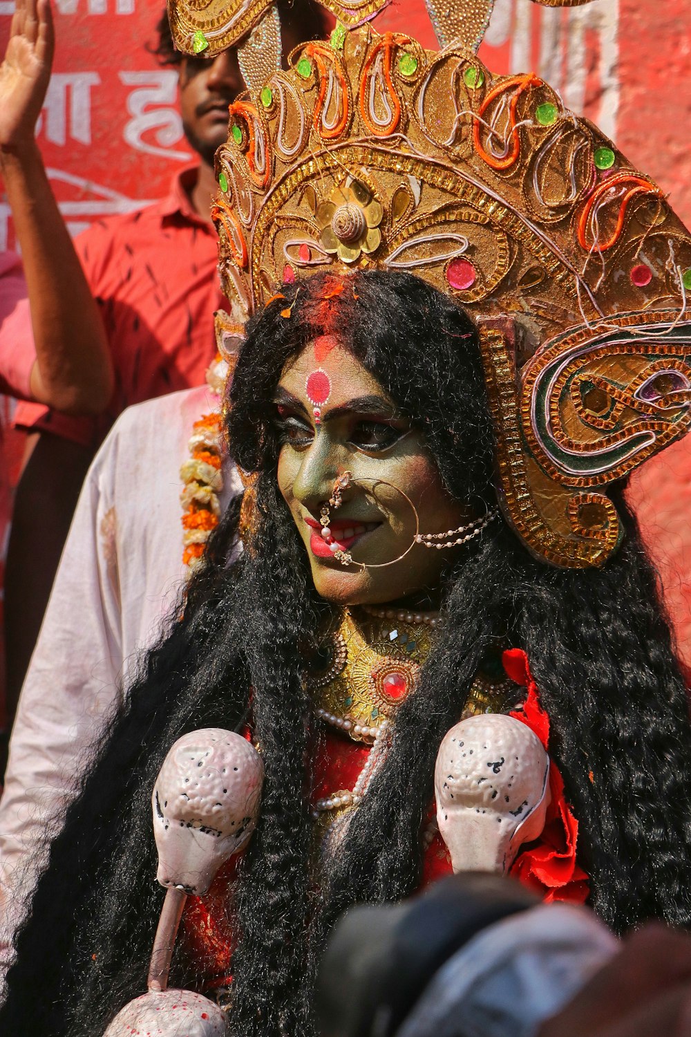 a person with a mask and a costume on