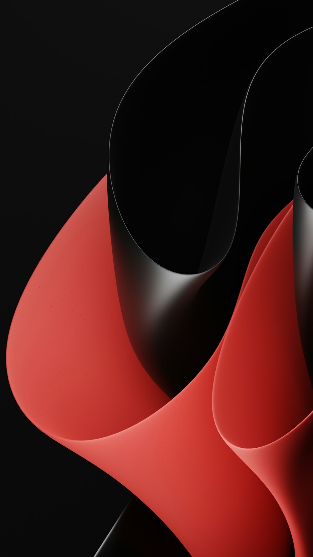 a close up of a black and red object