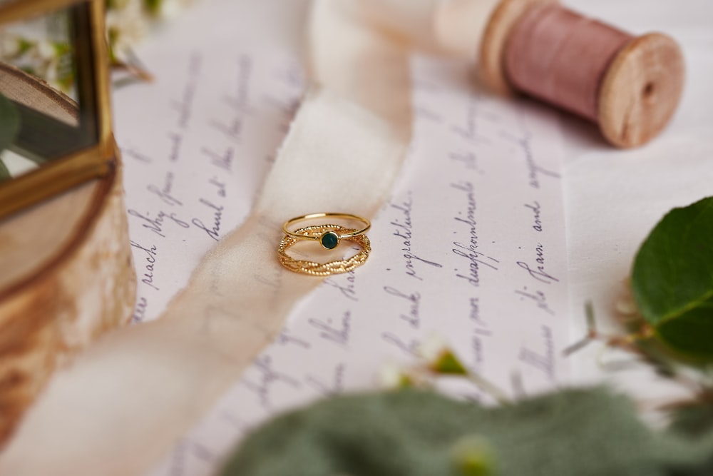 a close up of a ring on a piece of paper