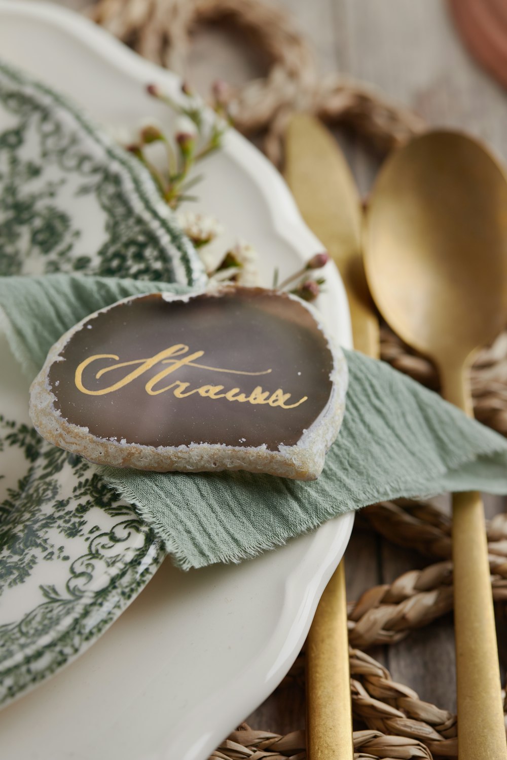 a plate with a heart shaped cookie on it