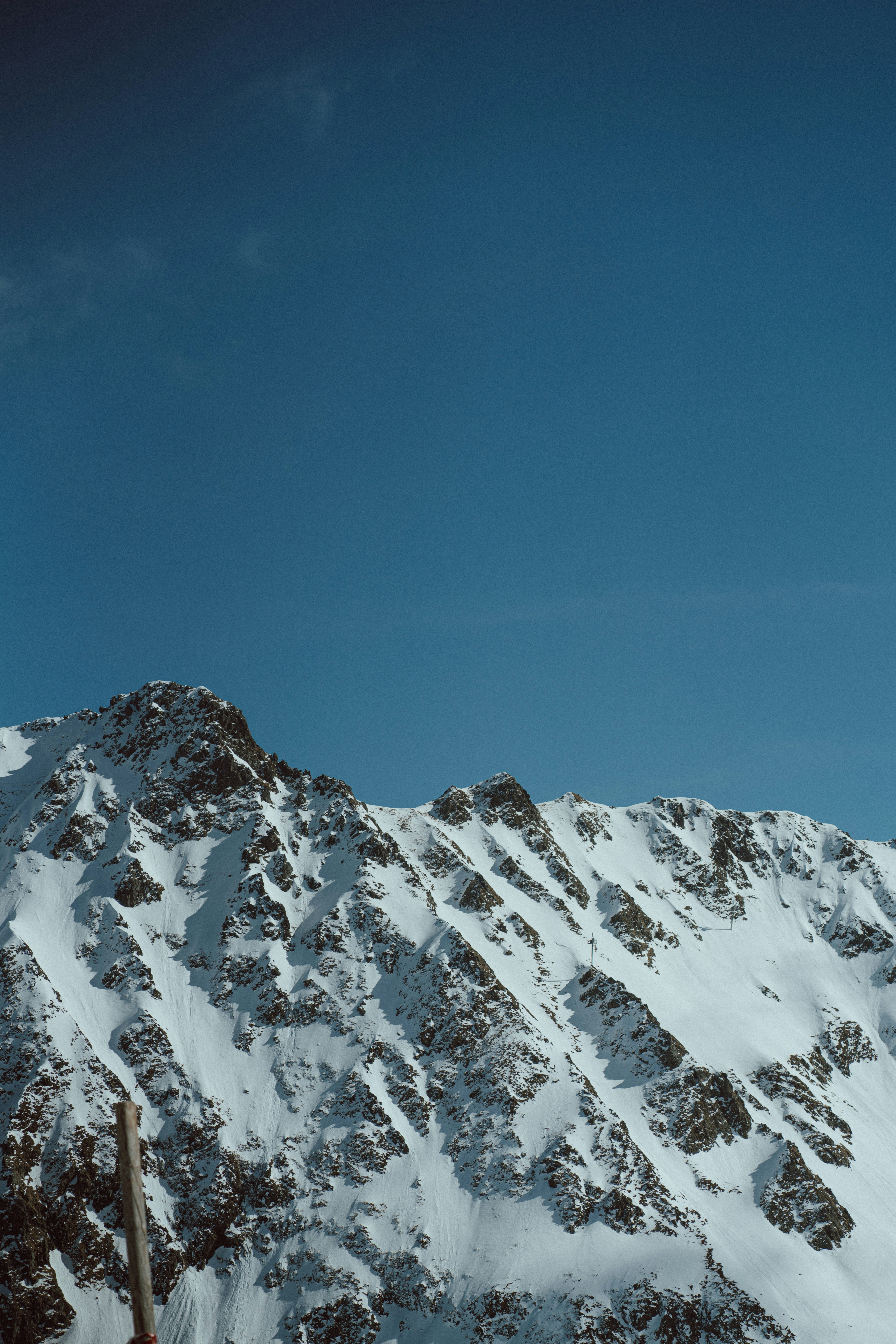a snowboarder is doing a trick in the air