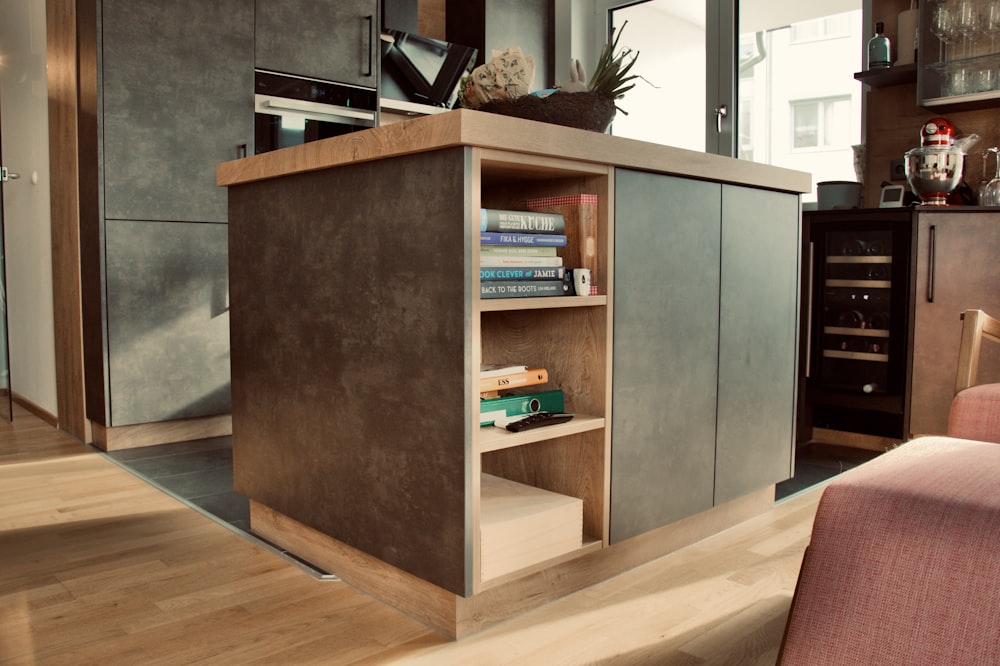 a living room with a couch and a book shelf