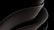 A sleek, smooth, and abstract form consisting of overlapping curved surfaces, primarily in dark tones and gradients. The design is fluid and modern, suggesting movement and elegance.