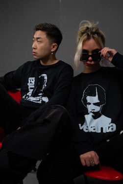 a man and a woman sitting next to each other