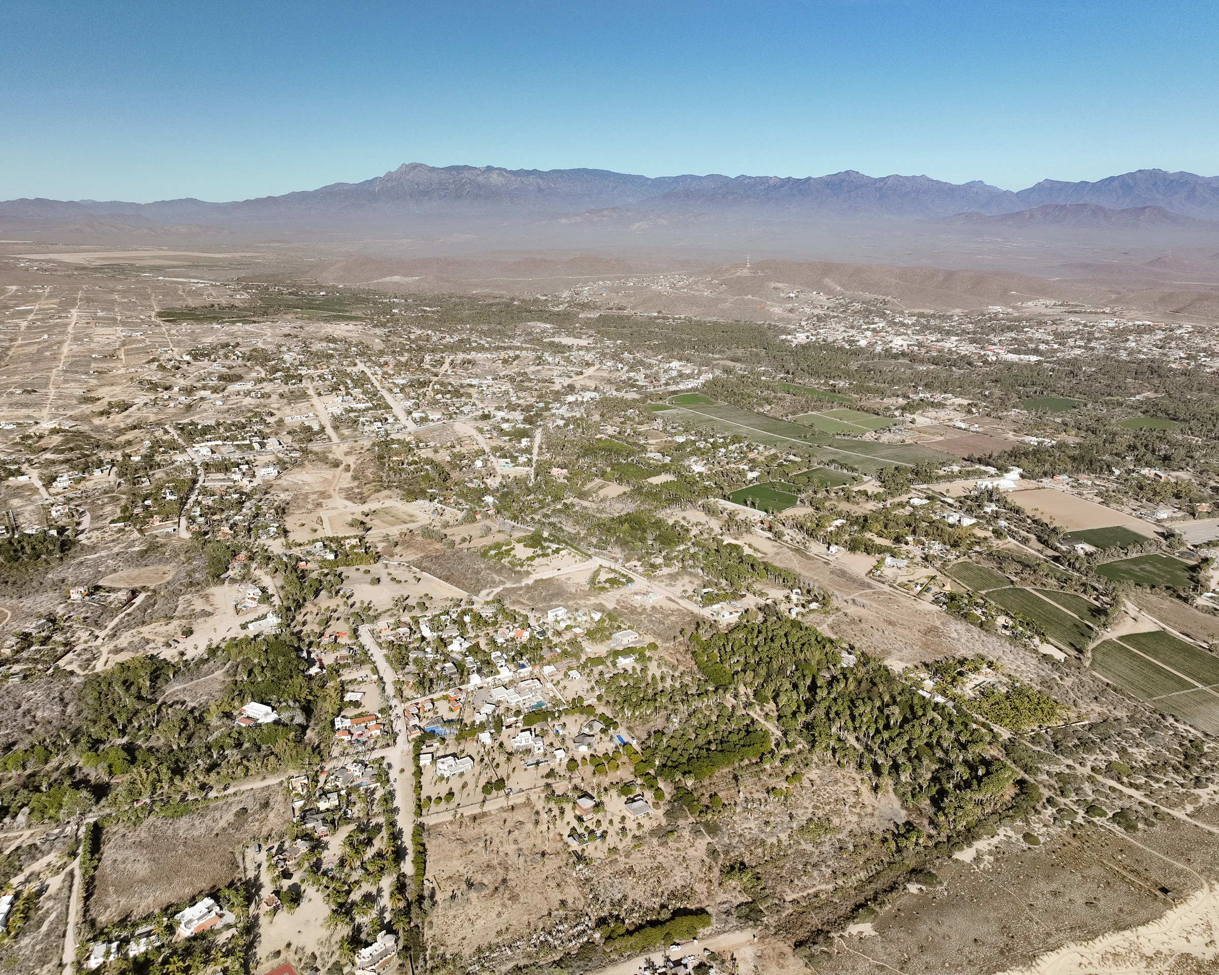 Aerial view of Todos Santos with the Sierra de la Laguna beyond