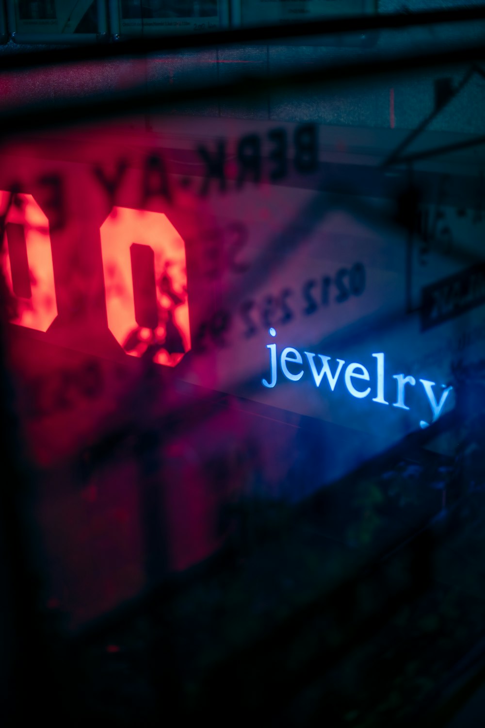 a close up of a neon sign on a building