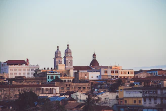 a view of a city with a clock tower