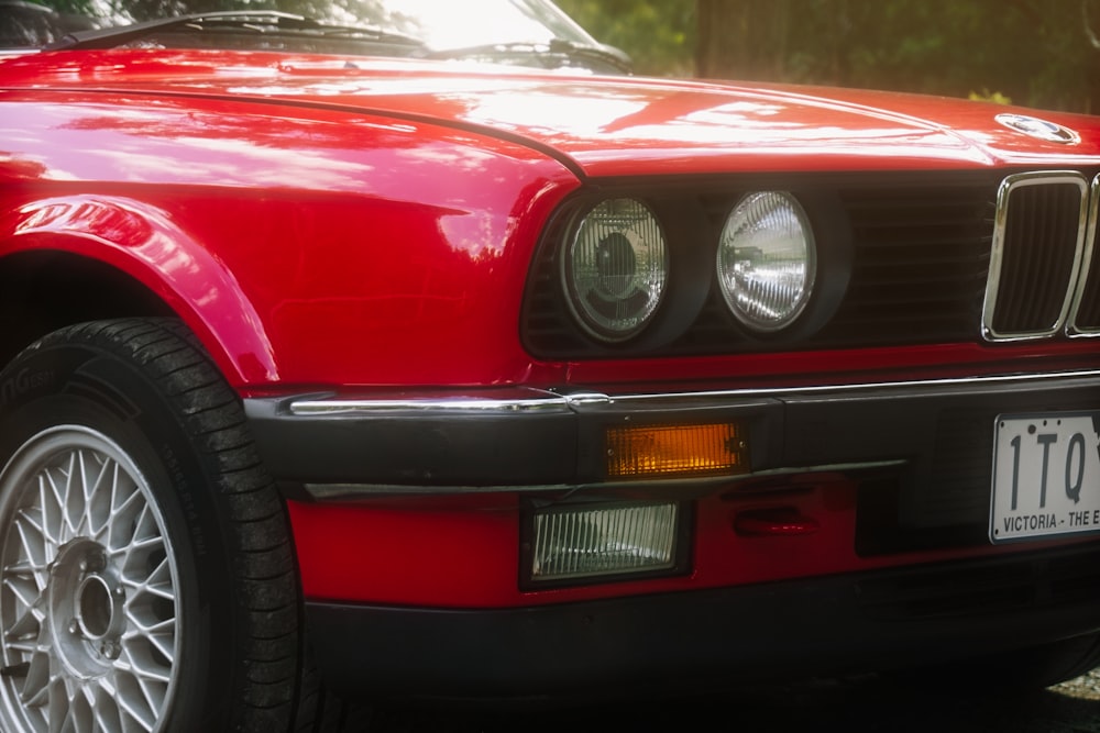 a red car parked in a parking lot