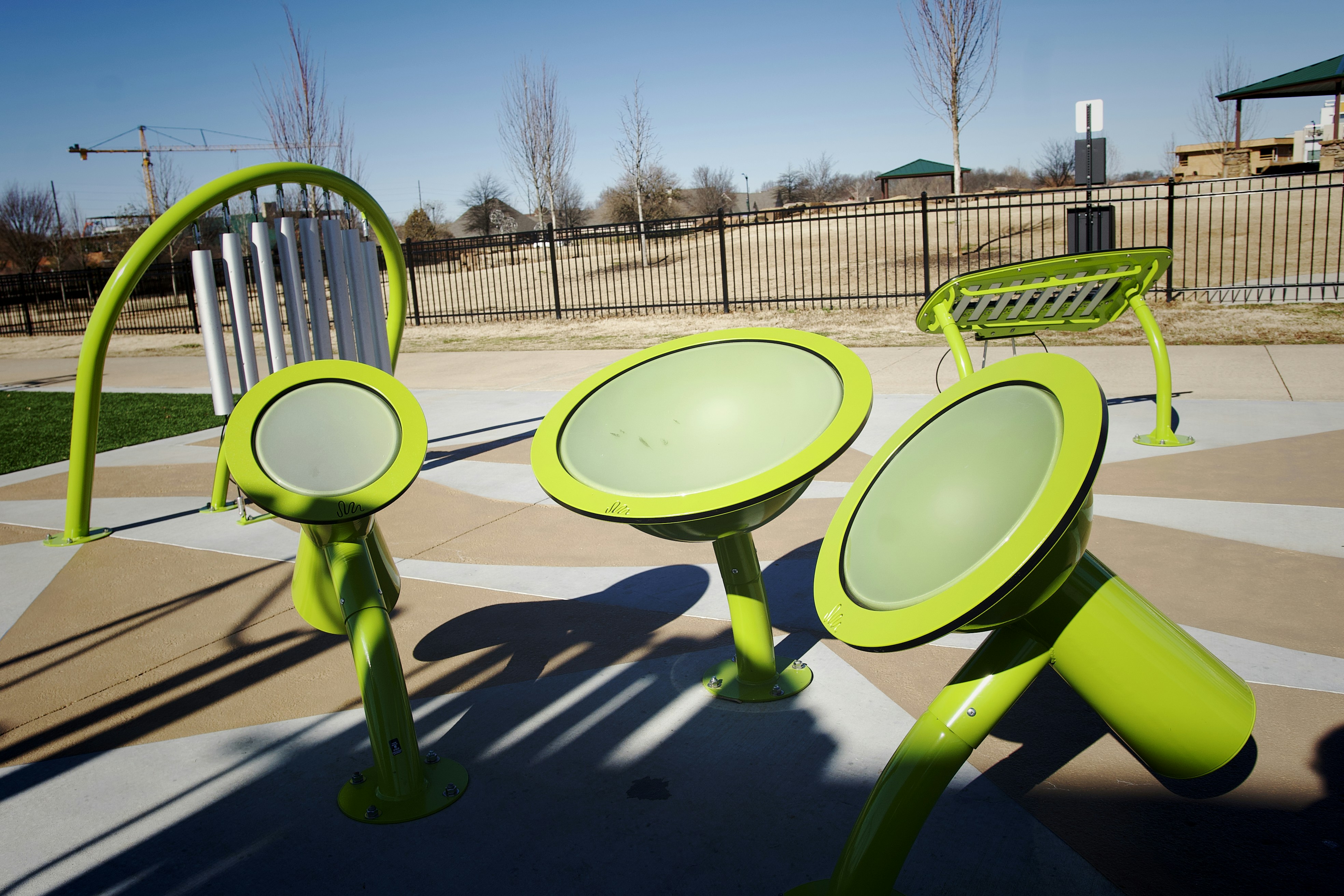 a couple of green chairs sitting next to each other