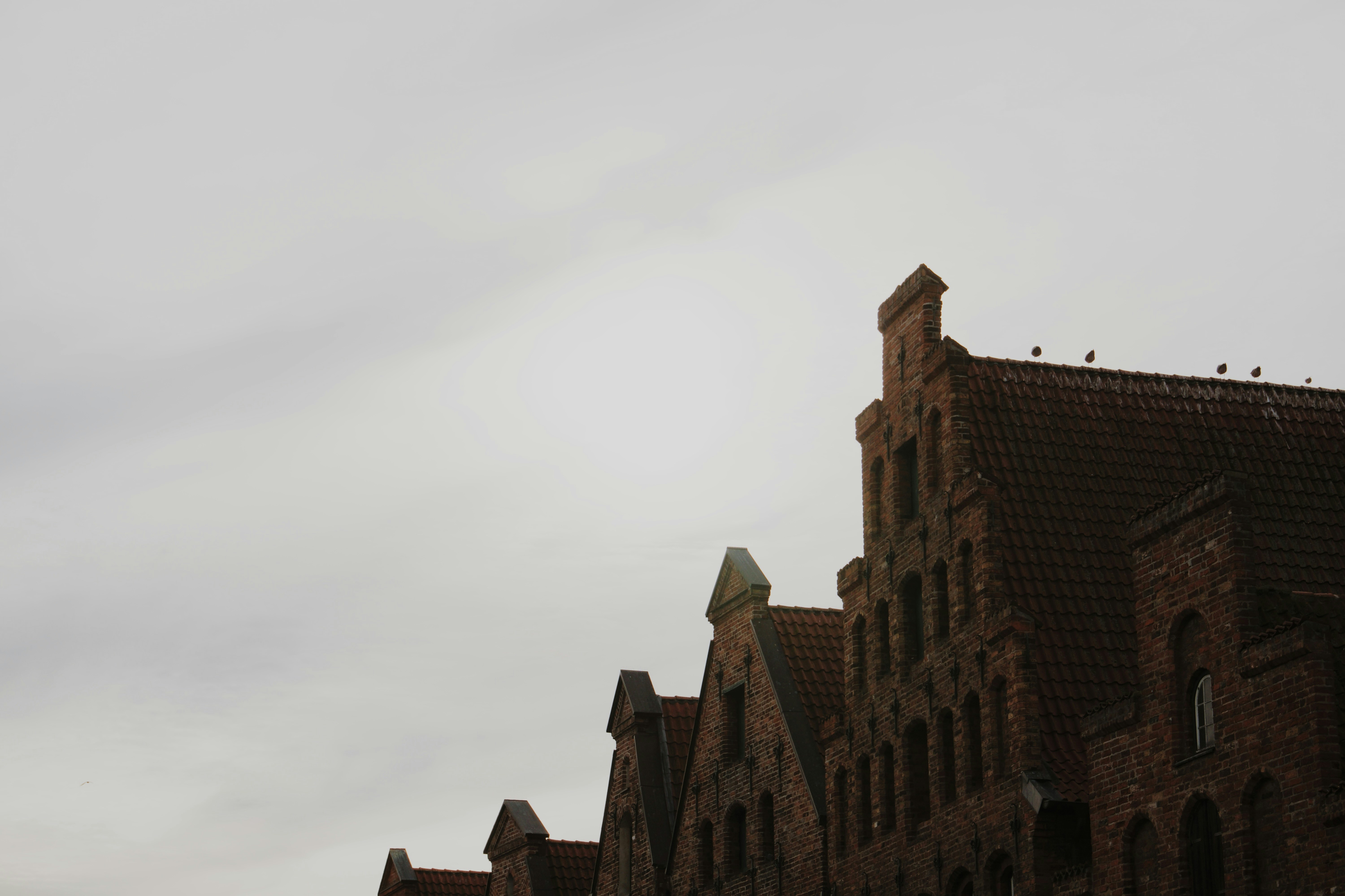 a large brick building with a clock tower