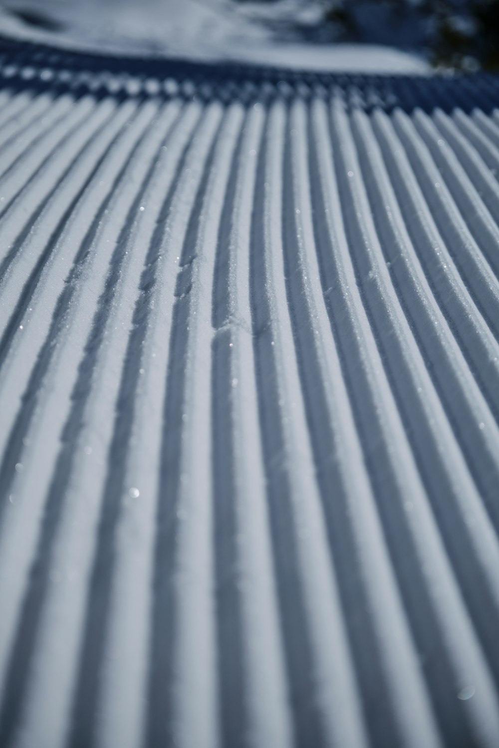a close up of a snow covered ski slope