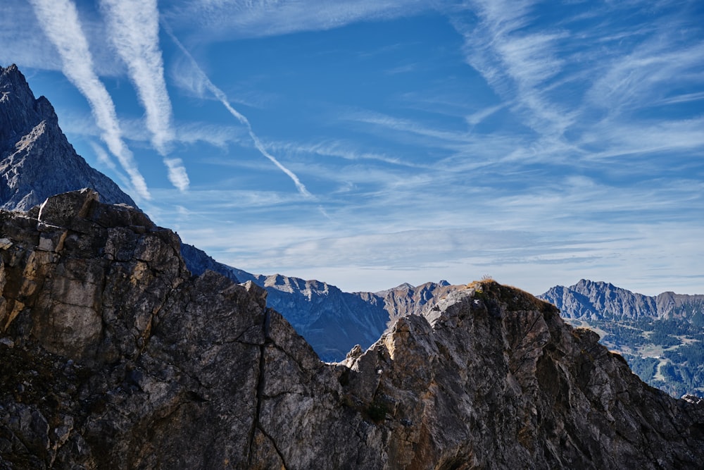 a view of the mountains from the top of a mountain