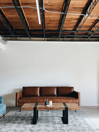 a living room with a couch and a coffee table