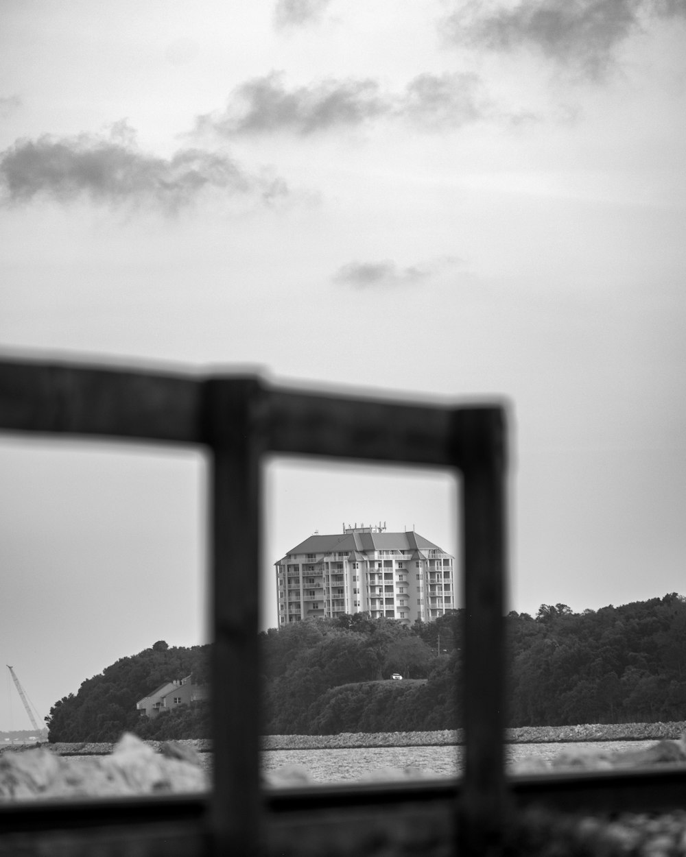 a black and white photo of a building in the distance