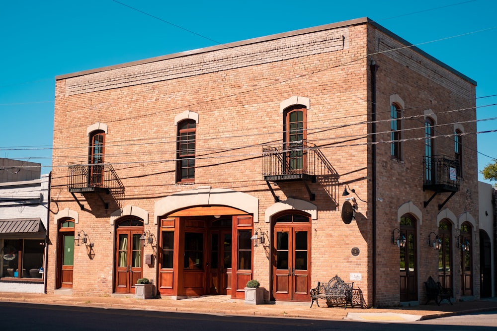 an old brick building with a balcony and balconies