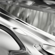 a black and white photo of a car's hood