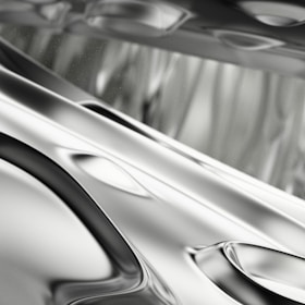 a black and white photo of a car's hood