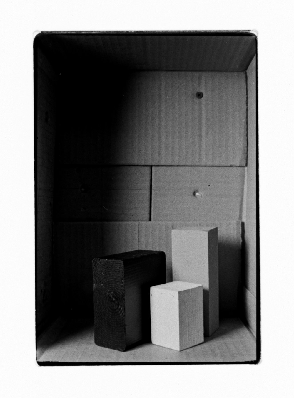 a black and white photo of some boxes