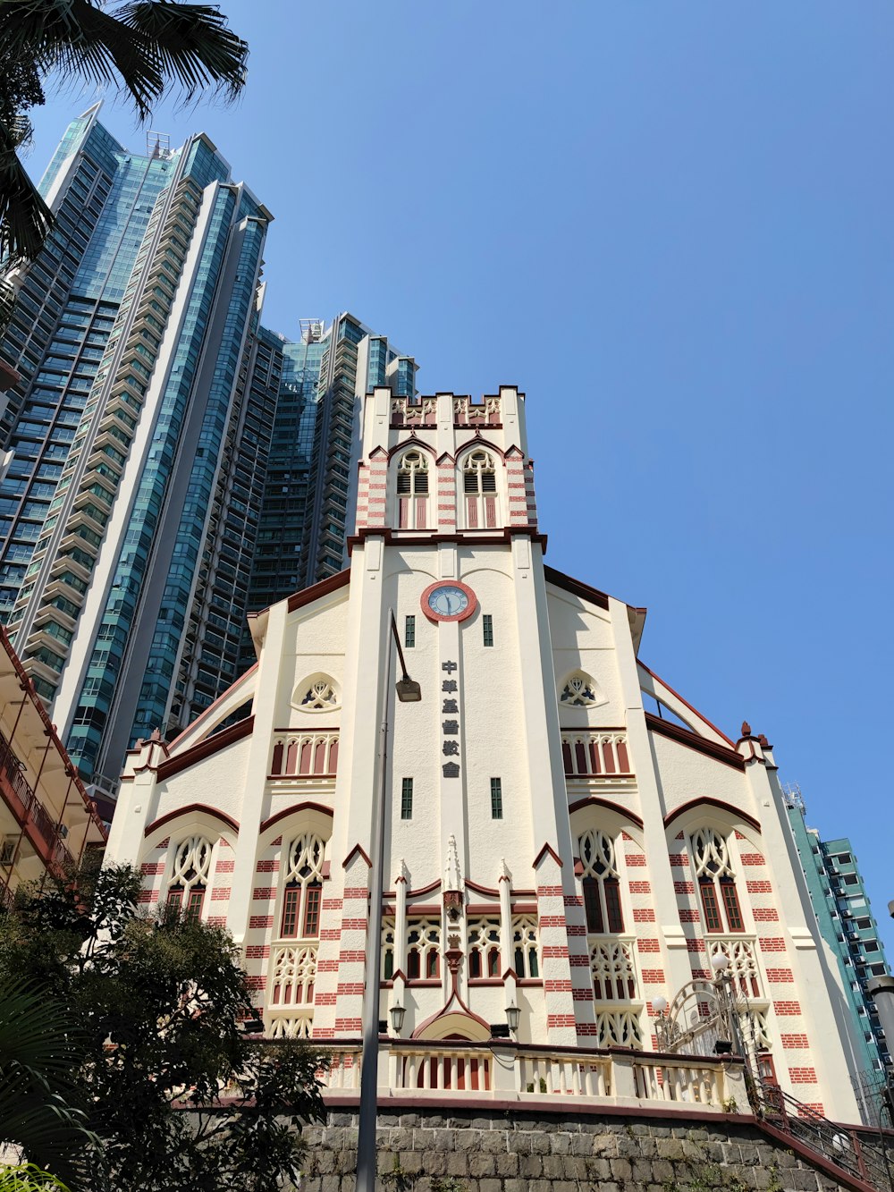 a tall building with a clock on the front of it