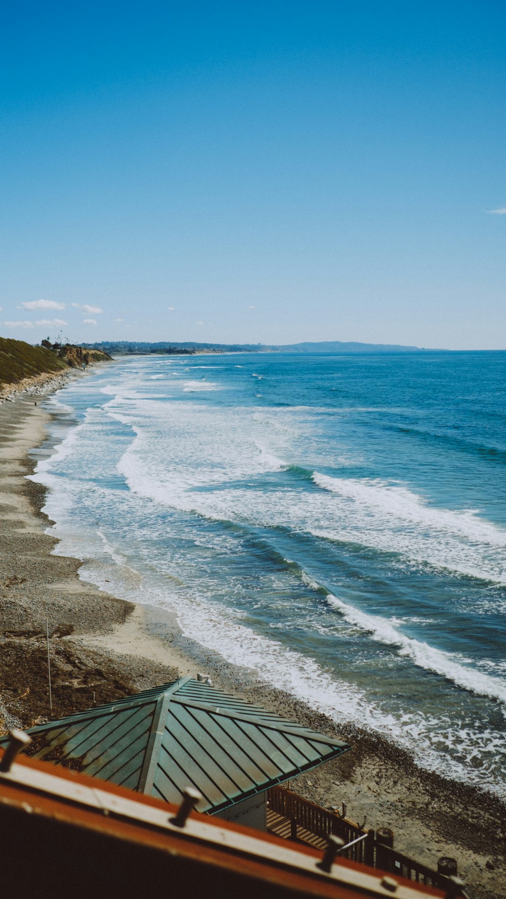 a view of a beach from a balcony