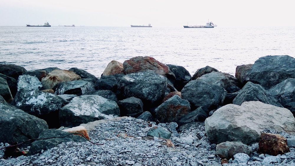 a large body of water surrounded by rocks