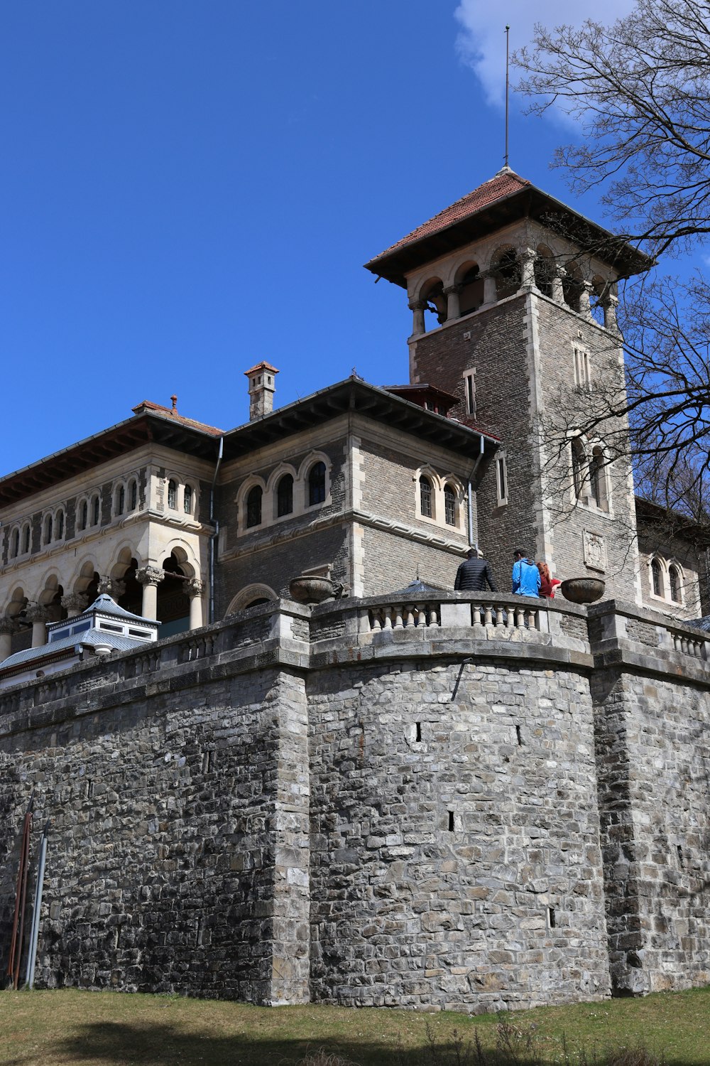 a large stone building with a clock tower