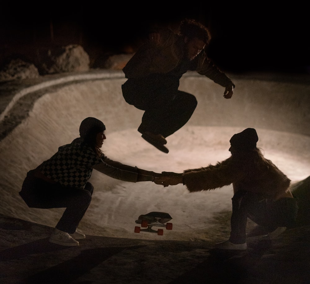 a man flying through the air while riding a skateboard