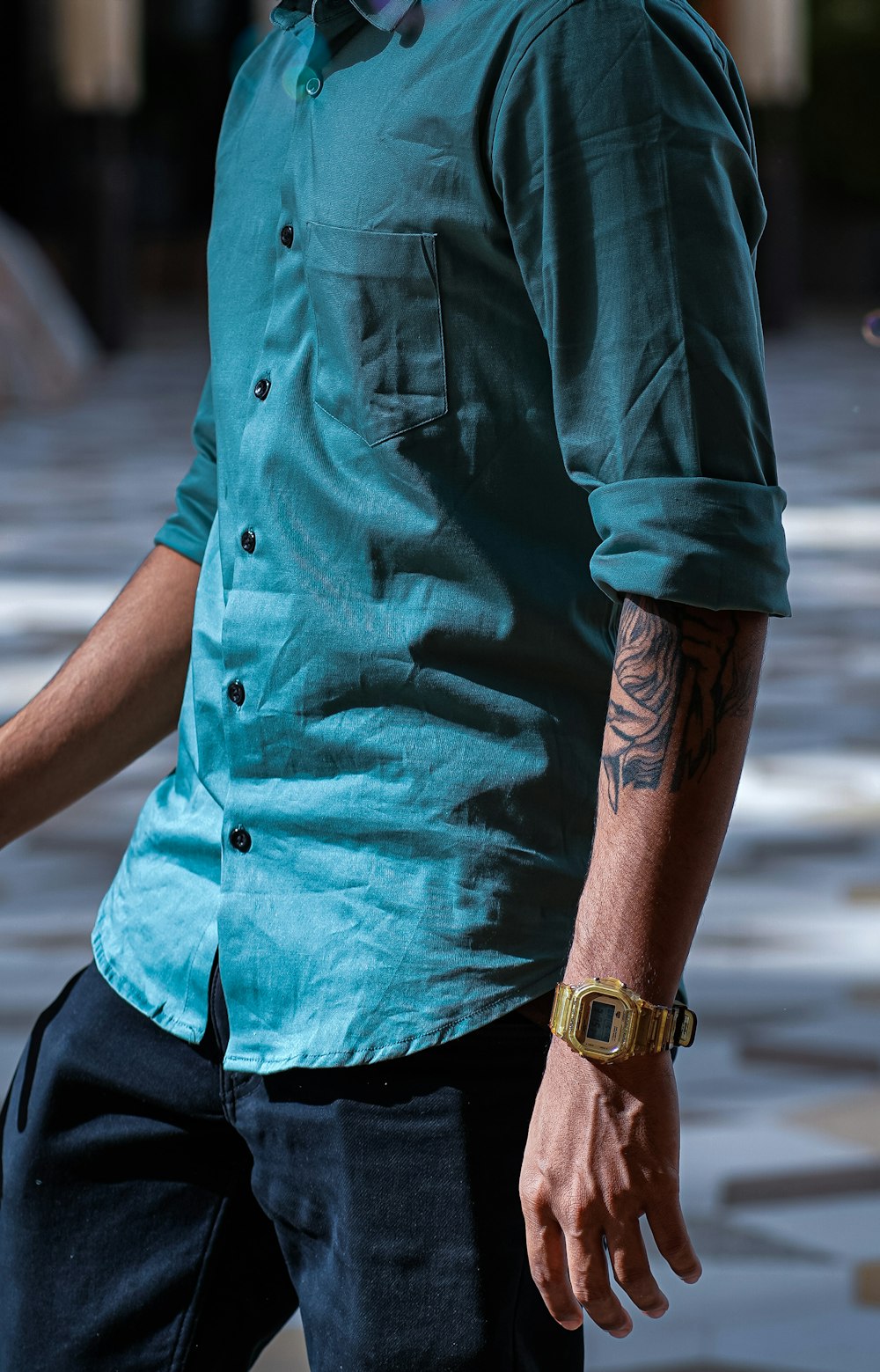 a man with a tattoo on his arm