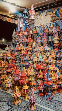 Animated scene from a Ramadan-themed puzzle game with lanterns and crescent moons