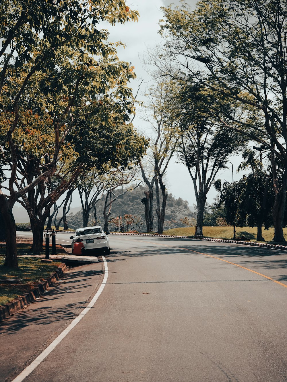 a car is parked on the side of the road